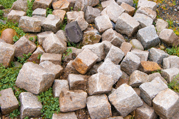 pile of cobblestone pavement texture background 