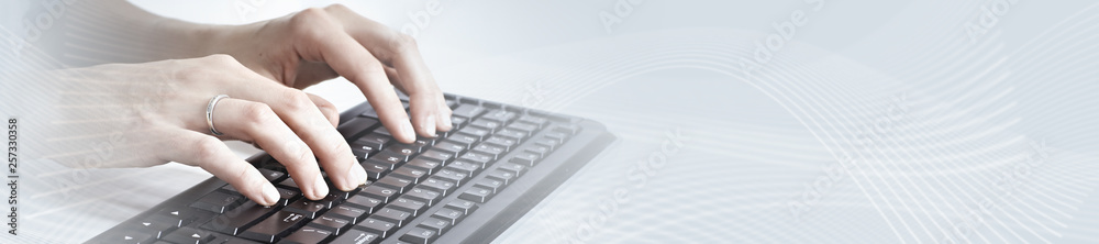 Aufkleber Hands typing on computer laptop.