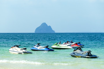 Jet ski`s in the  sea on Phi Phi island, Thailand. Sea fun background. Tropical travel concept.