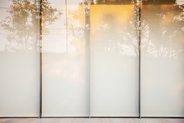 Glass walls with background.
