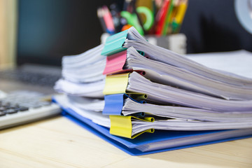 file folder and Stack of business report paper file on the table in a work office, concept document...