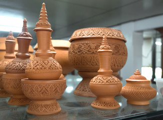 Fototapeta na wymiar Thai earthenware handmade carved pots.