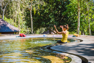 Asian woman relaxing in the Pool hot springs, Hot Springs In National Park And Natural Mineral Water.