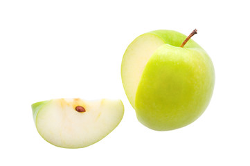 Green apple with a cut slice on a white background. Isolated.