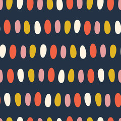 Abstract dots seamless vector kids background. Hand drawn oval dots pattern Coral pink gold yellow white blue. Simple shapes happy backdrop for children. For kids room decor, fabric, digital paper