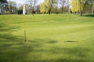 Obraz premium hole with flag