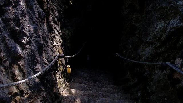 Entrance of Cenote Samula sinkhole light beam near Valladolid in Yucatan Mexico 