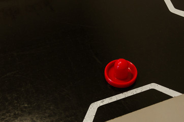 Pieces of a toy table hockey game