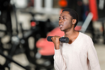 Young African American Holding Lifting Dumbbell