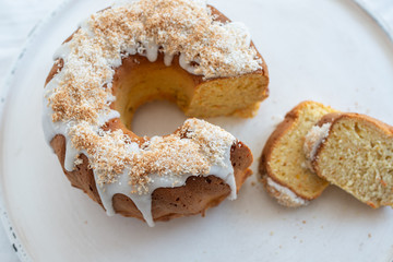 carrot apple sponge cake with coconut frosting