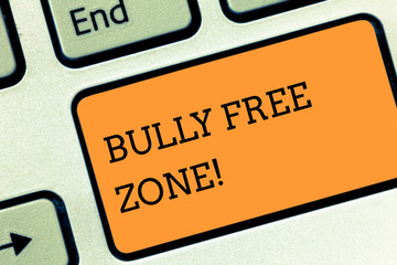 Text sign showing Bully Free Zone. Business photo text creating abuse free school college life Keyboard key Intention to create computer message pressing keypad idea