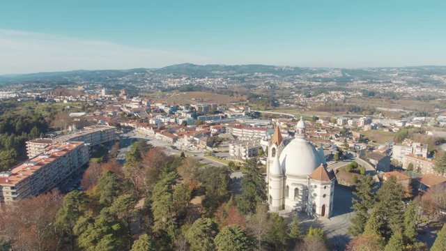 Aerial 4k shot on a sunny day of the sanctuary Sameiro and the city aound it in Penafiel, Portugal.