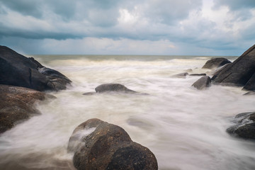 Long exposure shot.Sea scape with stone beach at sunset,Motion blur,slow shutter speed.