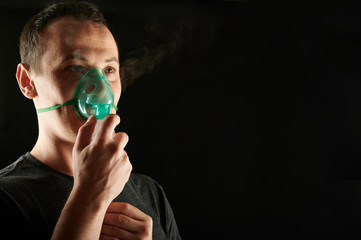 Man using inhaler mask