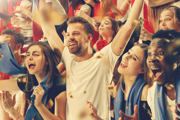 Group of happy fans are cheering for their team victory. Collage made of 8 models.