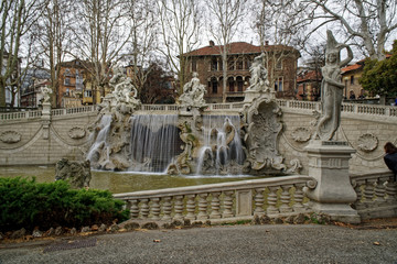 Fototapeta na wymiar Fountain on the Valentino park Square in Torino, Italy