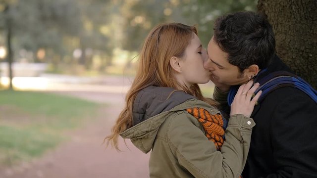 portrait of betrayal, infidelity.woman discovering her husband kissing another woman 