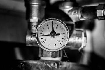 old pressure gauge. pipe pressure sensor.