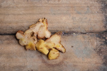 Close up view of ginger and Alpinia Root lengkuas ginger or galangal on wooden cutting board