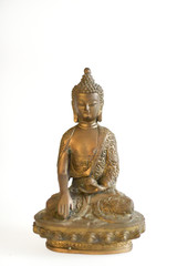 Copper Buddha on a white background