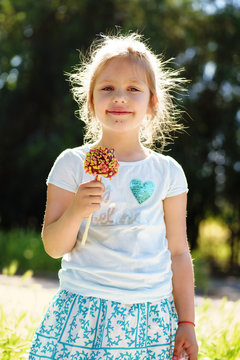  Girl   Eating Candy Apple