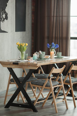 Background with cups and apple cake. tea party. charlotte pie. Table with flowers with copy space.
