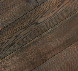 parquet from solid wood. sample of parquet. texture or background. wood texture. board. painted with natural oil. wax. mastic. imitation of valuable species of wood.