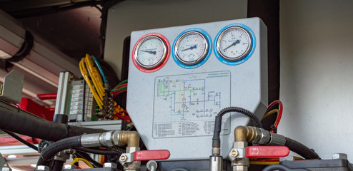 Close up on mechanics of a fire truck. Industrial, valves, mechanics.