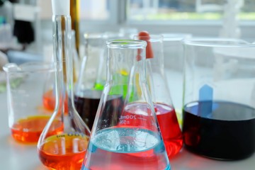 Chemical tube set development and pharmacy in laboratory  with multicolored substances in laboratory - Image