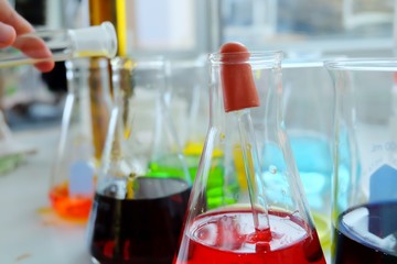 Chemical tube set development and pharmacy in laboratory  with multicolored substances in laboratory - Image