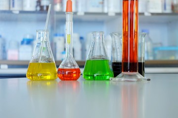 Chemical tube set development and pharmacy in laboratory  with multicolored substances in laboratory - Image