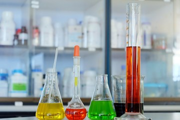 Chemical tube set development and pharmacy in laboratory  with multicolored substances in laboratory - Image