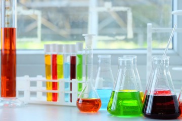Chemical tube set development and pharmacy in laboratory  with multicolored substances in laboratory - Image