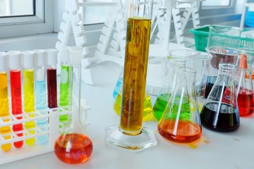 Chemical tube set development and pharmacy in laboratory  with multicolored substances in laboratory - Image