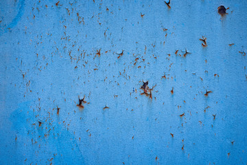 old painted rusty metal surface with corrosion traces for texture or background