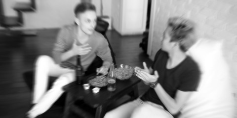 background football fans watch the match and drink beer