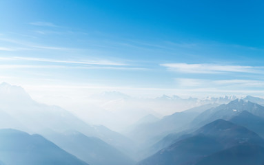 Fototapeta na wymiar Swiss Alp Mountaintops and Clear Blue Sky