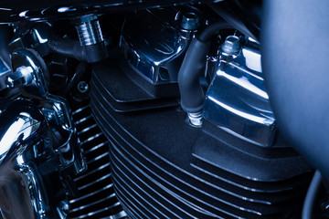 Motorcycle internal combustion engine with air cooling, close-up, detail, macro. Engine parts,...