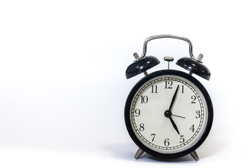 Alarm clock on a white background