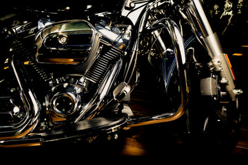 Motorcycle chopper with air-cooled engine. Chrome exhaust pipe