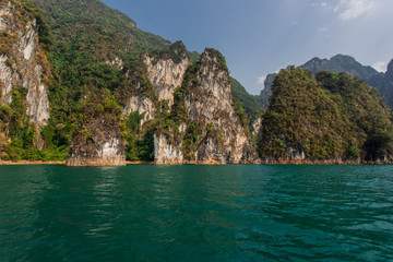 Fototapeta na wymiar Three rocks in Cheow Lan Lake, Khao Sok National Park at Suratthani,Thailand