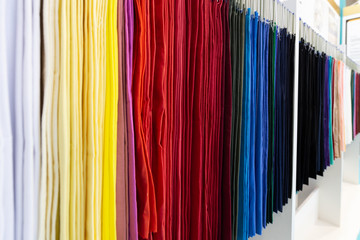 Many samples of multi-colored fabric.