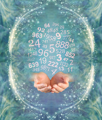 Ask a Numerologist for guidance - female cupped hands emerging from an ethereal jade green  energy...