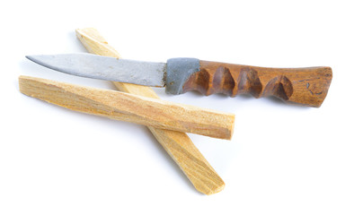 Palo santo, Holy Wood sticks with handmade knife isolated on white background.
