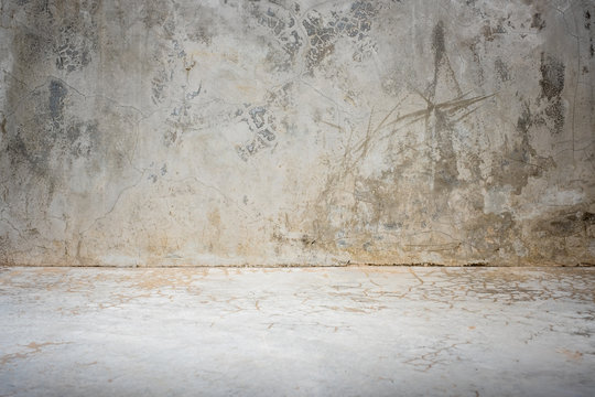 grunge concrete studio room background with light.mock up space for display of product or design..