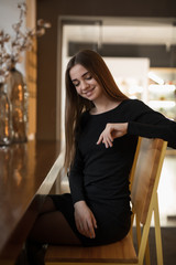 Portrait of pretty woman in cafe