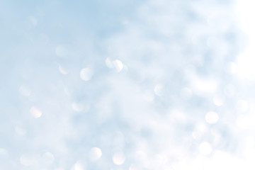 Abstract natural bokeh background in white and blue colors