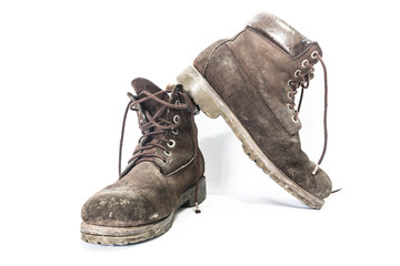 Old leather boots On a white background