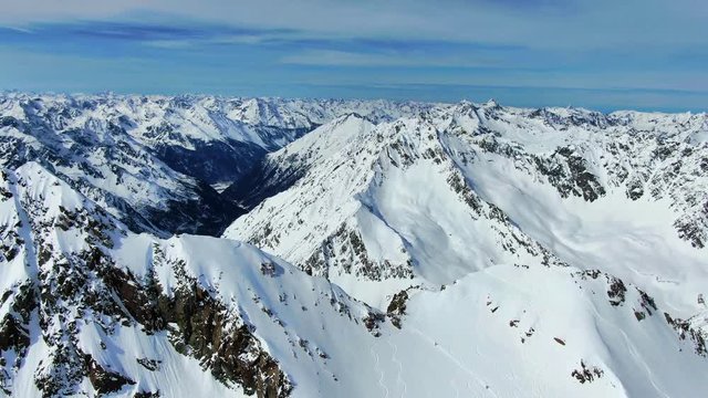 Stunning aerial drone panoramic footage of the Stubai Alps mountain range just below the summit of Schrankogel mountain (3497m).Stubai alps are located in Austria, in Central Eastern Alps of Europe.