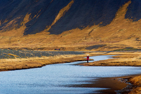 Woman enjoying stunning Icelandic scenery